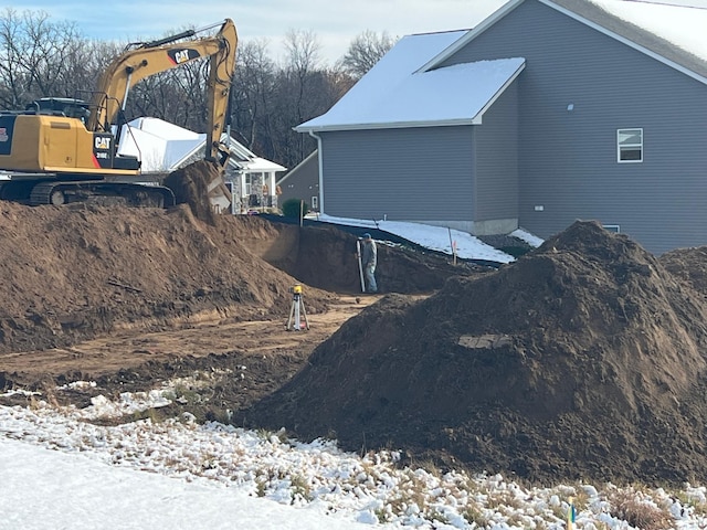 view of snow covered property