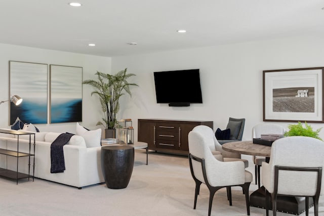 living room with light colored carpet