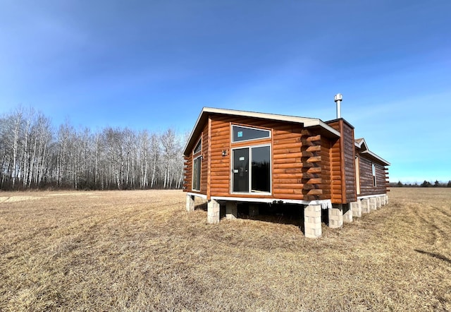 view of home's exterior featuring log exterior