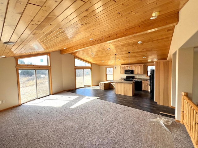 kitchen with a center island, lofted ceiling with beams, open floor plan, black appliances, and dark colored carpet