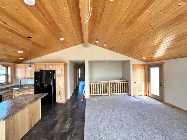 kitchen with black fridge with ice dispenser, light brown cabinetry, wood ceiling, dark countertops, and vaulted ceiling with beams