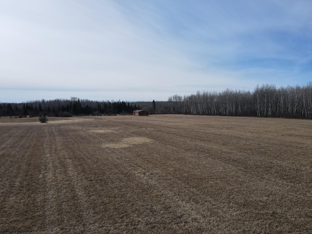 exterior space with a rural view