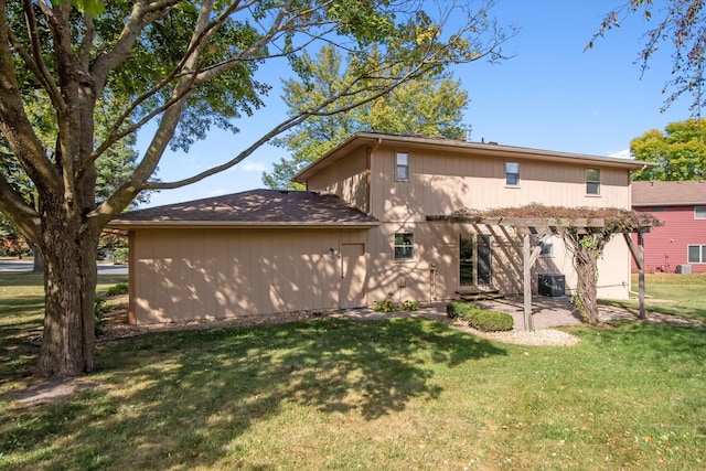 rear view of property with a patio, a lawn, and cooling unit