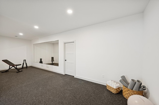 workout area with recessed lighting and baseboards