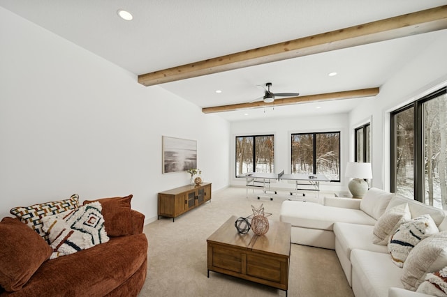 living area featuring beam ceiling, recessed lighting, a ceiling fan, and carpet