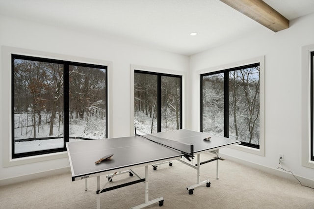 unfurnished office featuring recessed lighting, baseboards, beam ceiling, and carpet flooring