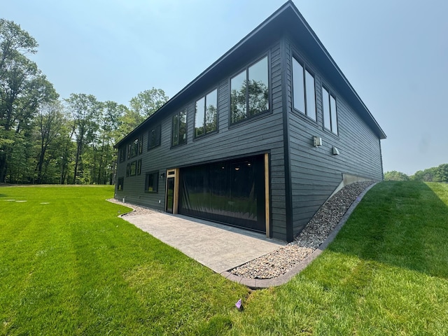 14805 Stutz St NE, Ham Lake, MN 55304 - rear view of property featuring a lawn