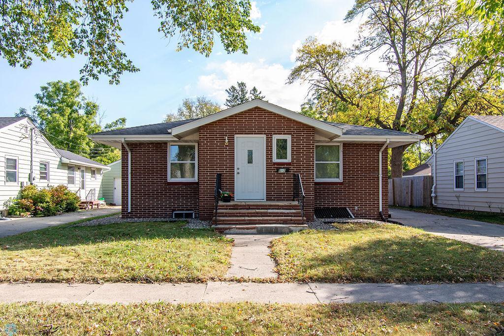 bungalow with a front yard