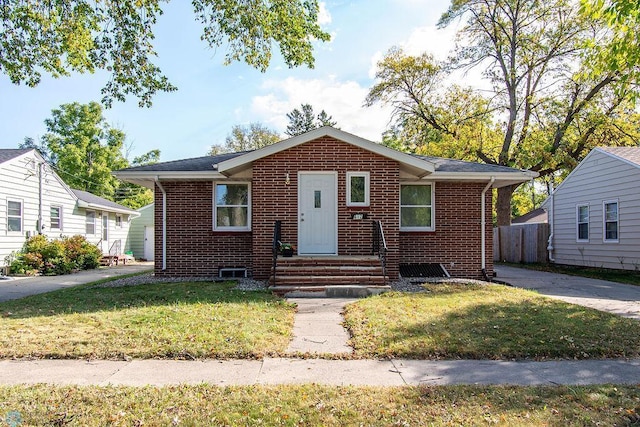 bungalow with a front yard