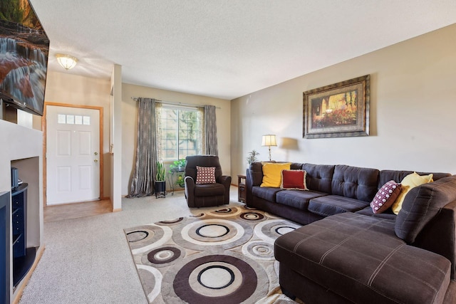 living room featuring light carpet and a textured ceiling