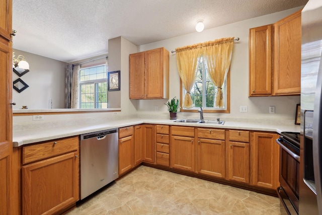 kitchen with a textured ceiling, black electric range, sink, and dishwasher