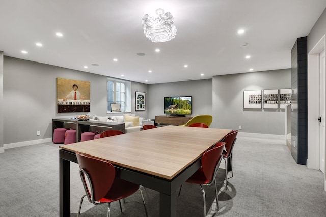 view of carpeted dining space