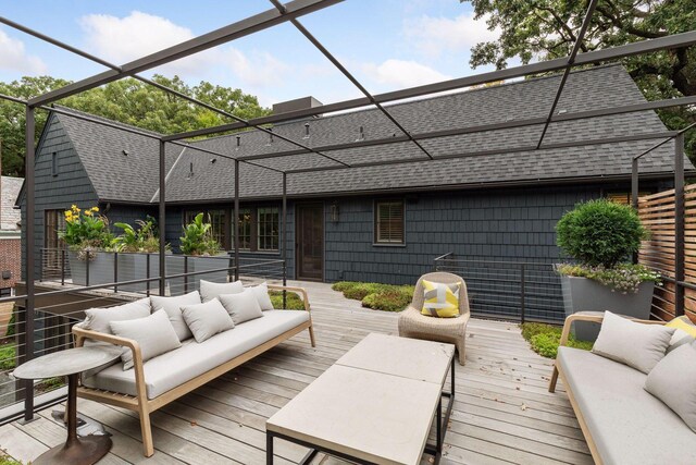 wooden deck featuring an outdoor hangout area