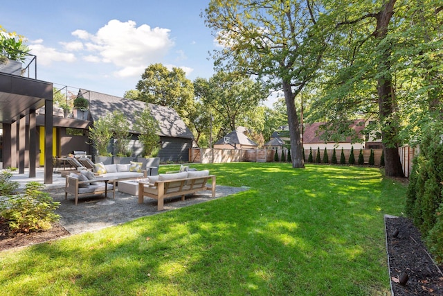 view of yard with an outdoor hangout area and a patio