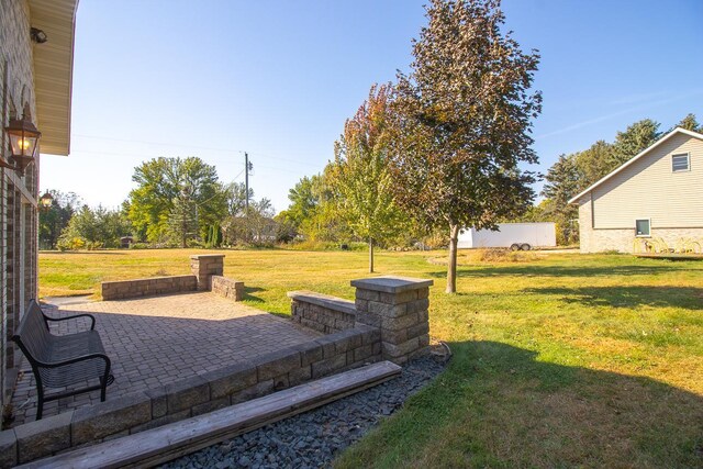 view of yard with a patio area