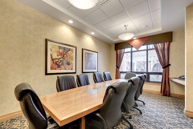 home office with baseboards, a drop ceiling, carpet, a tray ceiling, and recessed lighting