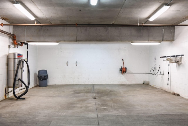 garage featuring concrete block wall