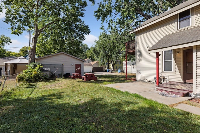 view of yard with fence and a patio