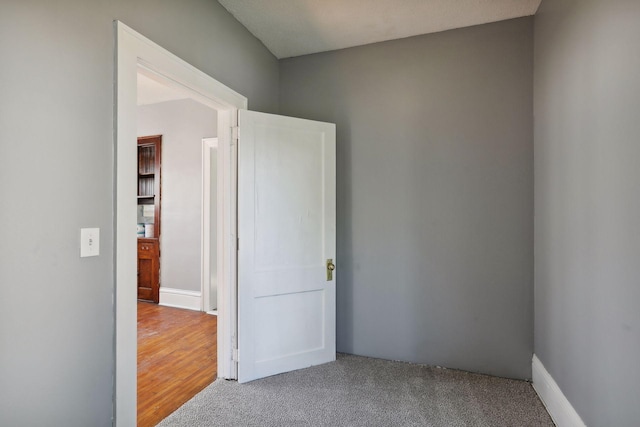 empty room featuring carpet floors