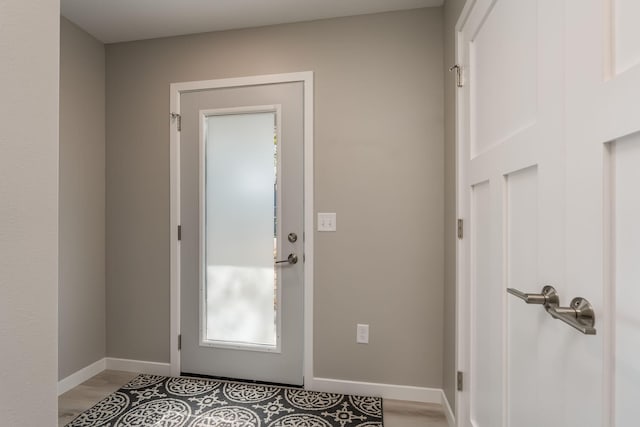 doorway to outside featuring light hardwood / wood-style floors