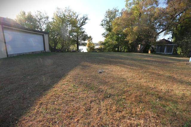 view of yard featuring a garage