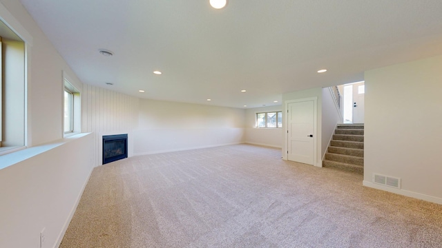 basement with light colored carpet