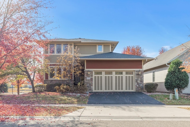 view of front of property with a garage