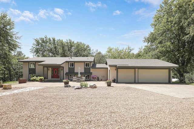 view of front of property featuring a garage