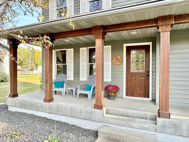 doorway to property with a porch