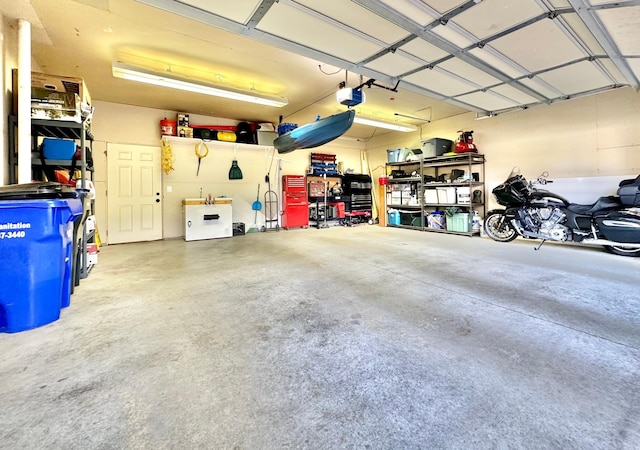 garage featuring a garage door opener