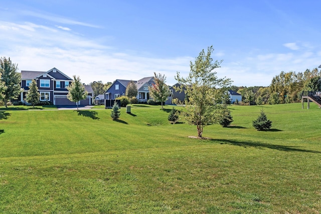 view of community featuring a lawn