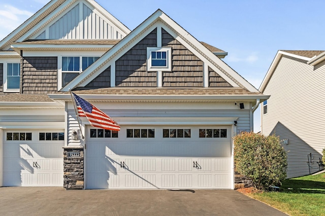 view of front of property with a garage