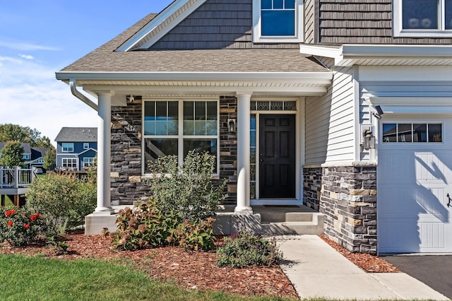 entrance to property featuring covered porch