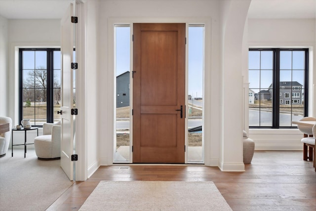 foyer entrance featuring light hardwood / wood-style floors