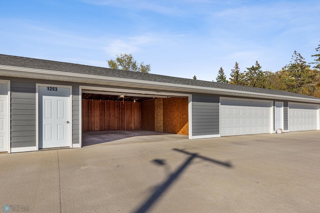 garage with wood walls