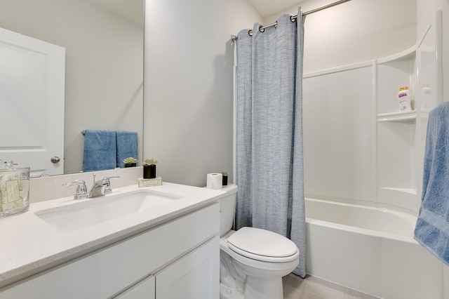 full bathroom with tile patterned floors, shower / bath combo with shower curtain, vanity, and toilet