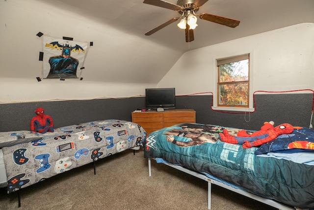 carpeted bedroom featuring lofted ceiling and ceiling fan