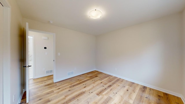 empty room featuring light hardwood / wood-style floors