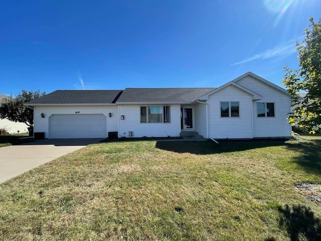 single story home with a front lawn and a garage