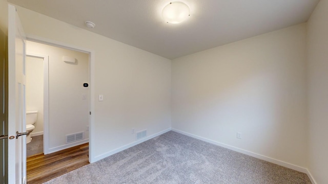 unfurnished room featuring carpet flooring