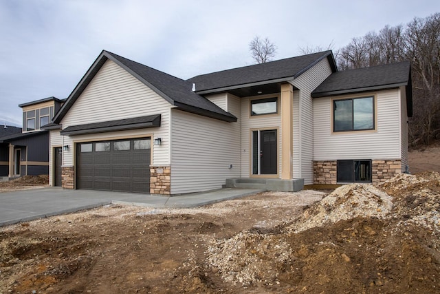 view of front of property featuring a garage