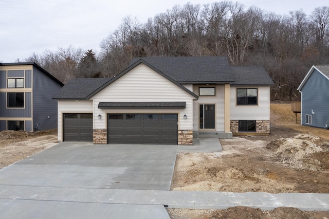 view of front of home with a garage