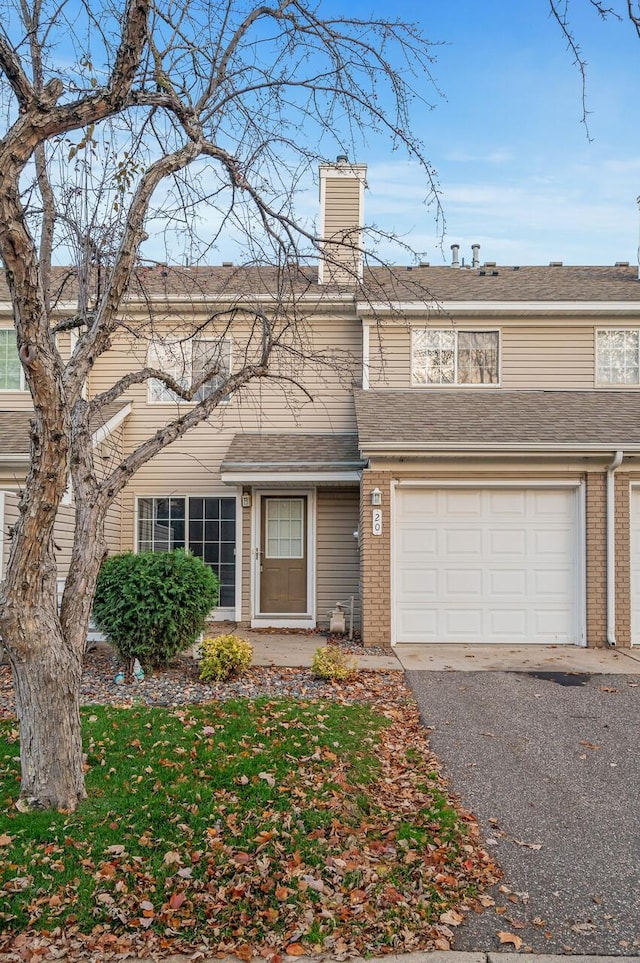 view of front of property with a garage