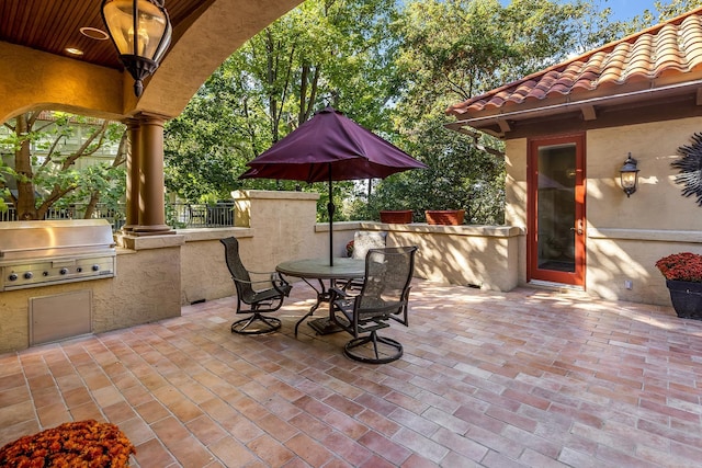 view of patio with area for grilling