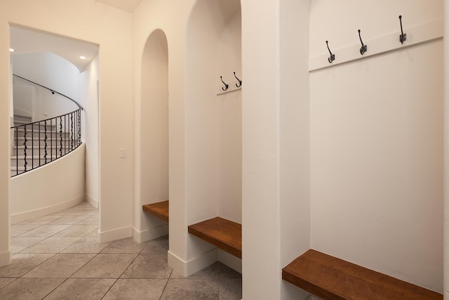 mudroom with light tile patterned floors