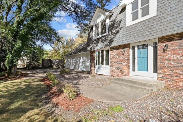 property entrance with a garage