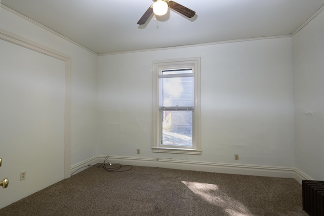 unfurnished room featuring ceiling fan, carpet floors, and ornamental molding