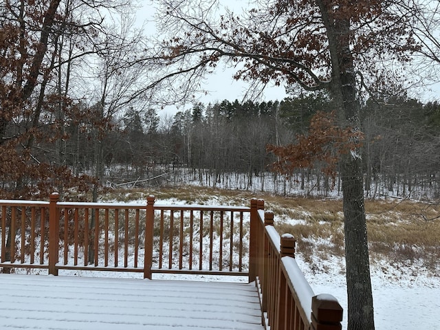 view of snow covered deck