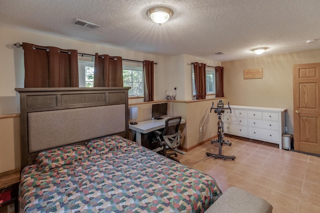 bedroom with a textured ceiling