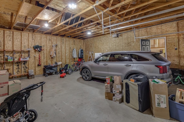 garage featuring a garage door opener